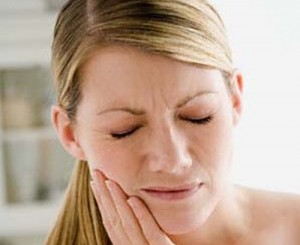 Young Woman with a Toothache